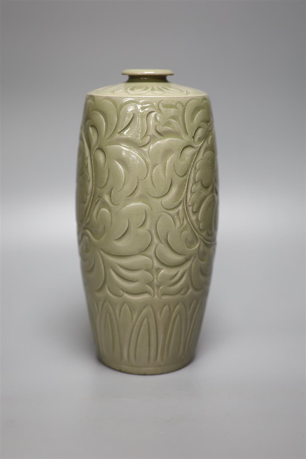 A Chinese carved celadon vase, height 26cm